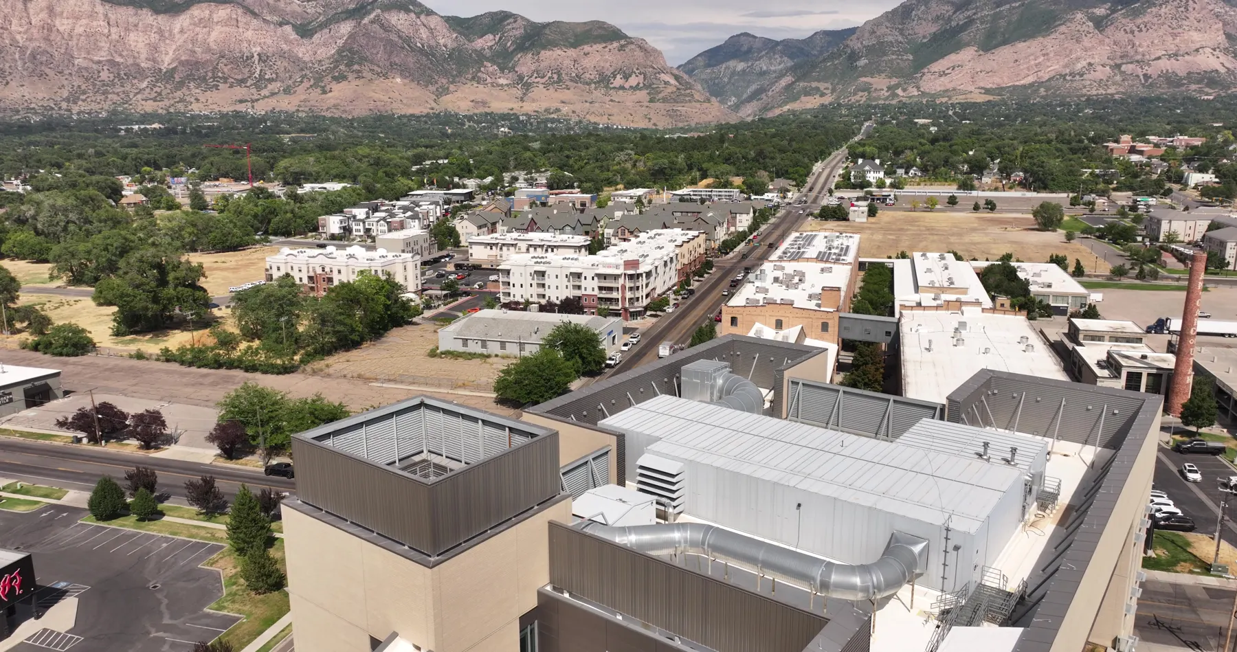 Aerial view of Ogden with the Wasatch Mountains rising behind the city